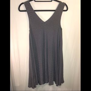 Black and white striped sleeveless dress.